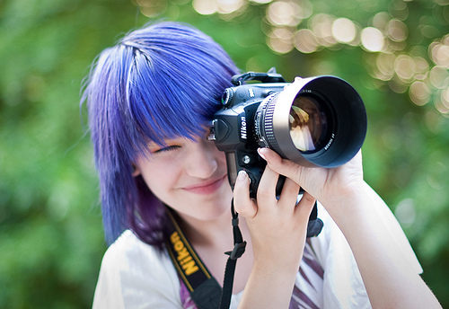 girl-holding-digital-camera.jpg